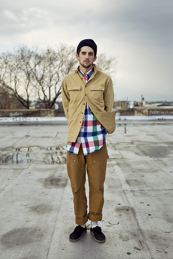 A portrait of Mac Huelster on a rooftop in Bushwich, Brooklyn, New York