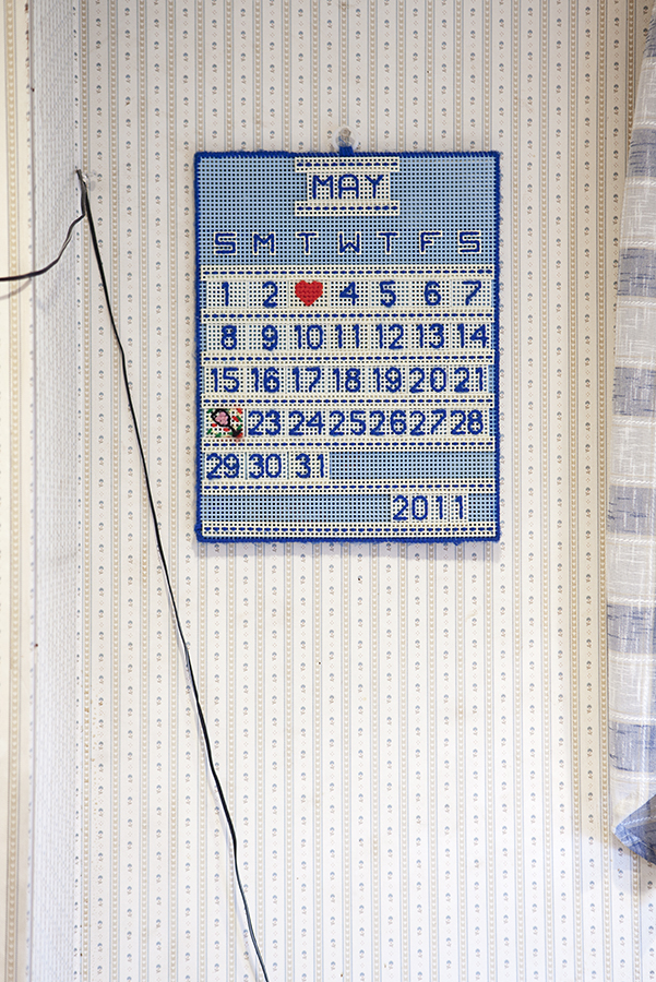 A lovingly hand knit calendar hangs in the kitchen of a grandmother on Long Island, New York